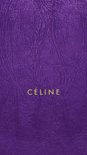 紫色皮革表面，帶有金色壓印文字CÉLINE。