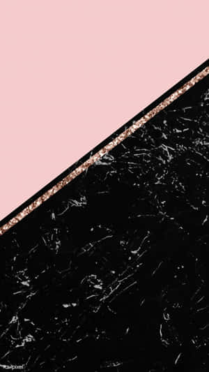 粉紅色與黑色大理石以玫瑰金閃粉線條分割。