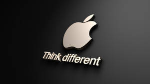 深色背景上帶有「Think different」標語的Apple標誌