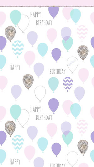 帶有閃粉和V形圖案的粉彩氣球以散落的文字慶祝生日。