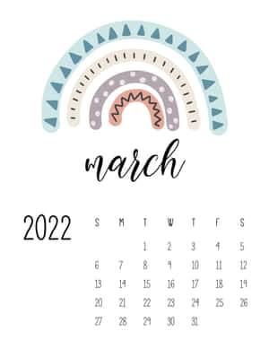 2022年3月月曆，網格上方有彩色彩虹設計。 — 三月 壁紙