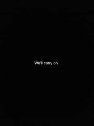 黑色背景上帶有白色文字「We'll carry on」