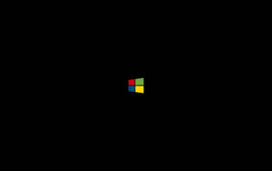 黑色背景上的 Microsoft Windows 標誌 — 視窗 壁紙