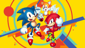 Sonic、Tails 和 Knuckles 在幾何背景上以色彩繽紛的卡通姿勢出現。