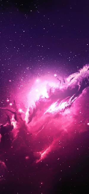 深邃太空中充滿活力的粉紅色和紫色星雲，帶有發光的星星。