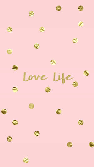 粉紅色背景，金色箔紙碎屑和草書文字寫著 Love Life。 — 玫瑰金 iPhone 壁紙