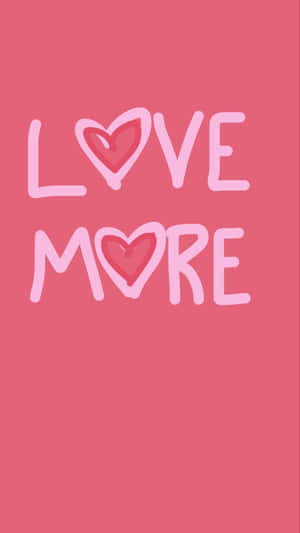 粉紅色牆紙，有「LOVE MORE」文字同心形符號。 — iPhone 8 壁紙