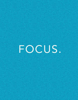 文字圖形，在帶有紋理的青綠色背景上顯示「focus」一詞。 — 攝影師 壁紙