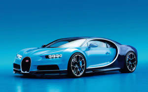 一輛藍色 Bugatti Chiron 跑車在攝影棚燈光下。