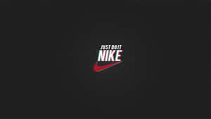 深色背景上的Nike標誌和「Just Do It」口號
