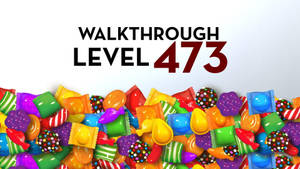 一堆色彩繽紛的糖果，附有文字 walkthrough level 473。
