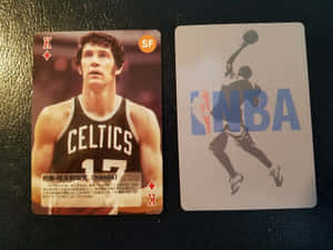 兩張NBA球星卡，一張有塞爾特人球員，另一張有扣籃剪影。 — 籃球 壁紙