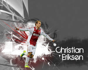 足球員 Christian Eriksen 在抽象背景圖形中移動。
