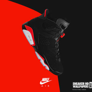 黑色Nike Air Jordan 6運動鞋，在紅色和黑色背景上帶有紅色和白色細節。