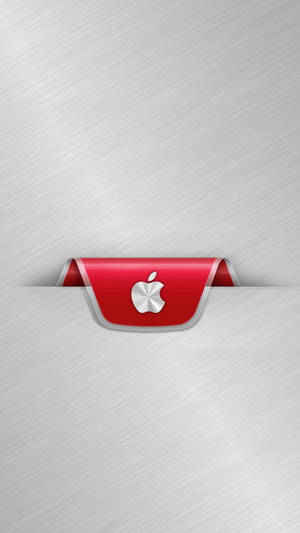 紅色Apple標誌從拉絲金屬表面浮現。 — 紅色 壁紙