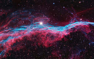 深空中帶有發光恆星的鮮豔紅色和藍色宇宙星雲。 — 太空 壁紙