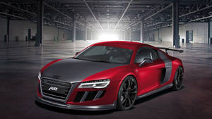 大型工業倉庫中的紅黑色ABT Audi R8跑車。 — Audi R8 GIF 壁紙