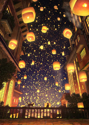 天燈在夜晚的城市街道上空升起，發出溫暖的光芒。 — 燈籠 壁紙