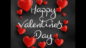 在黑板上被紅色心形包圍的Happy Valentine's Day訊息。 — 可愛情人節gif 壁紙