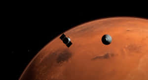 兩艘太空船喺太空中環繞住紅色行星火星運行。