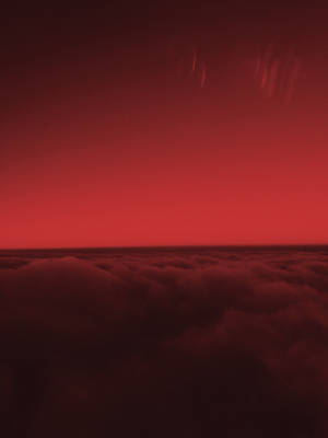 暮色中無盡雲海上的紅色天空 — 唯美雲朵動態 壁紙