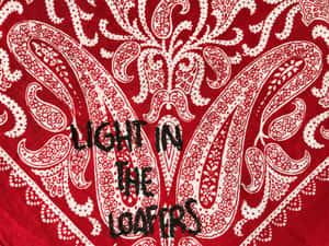紅色頭巾，白色佩斯利圖案，黑色文字 light in the loafers — 藍色頭巾 壁紙