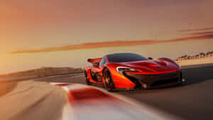 紅色McLaren P1在日落時分於海岸公路上飛馳，帶有動態模糊效果。
