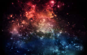 充滿活力的宇宙星雲，在深空中有紅色和藍色的雲層以及散落的星星。 — 太空 壁紙
