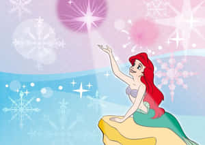 美人魚艾莉爾在雪白的水下場景中伸手觸碰發光的星星。 — 美人魚 GIF 壁紙