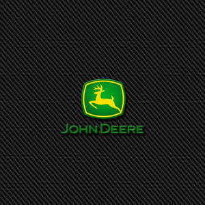 碳纖維背景上的 John Deere 標誌
