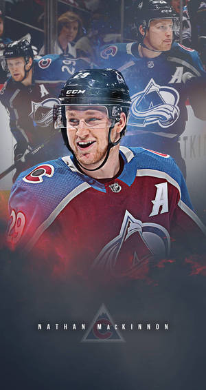 Nathan Mackinnon 身穿科羅拉多雪崩隊球衣在冰球比賽中微笑。 — 冰 GIF 壁紙
