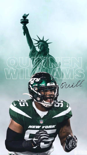 身穿綠色球衣的足球運動員Quinnen Williams，身後是自由女神像。