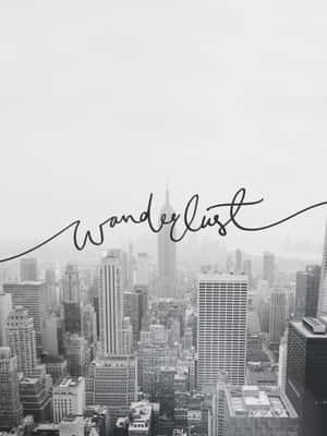 黑白城市景觀，覆蓋草書文字 'wanderlust'。