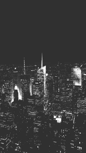 黑白夜景城市景觀，摩天大樓燈火通明。 — 美學 壁紙