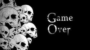 黑色背景上的Game Over文字與骷髏頭 — 暗色 壁紙