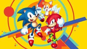 色彩繽紛的卡通風格 Sonic、Tails 和 Knuckles 搭配幾何背景。 — 設計 壁紙