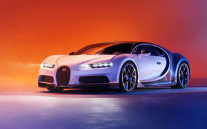 白色Bugatti Chiron跑車在工作室中，配有橙色和藍色燈光。