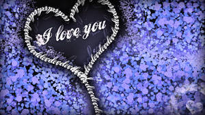 一個發光的愛心，帶有「I love you」文字，周圍環繞著紫色閃光。