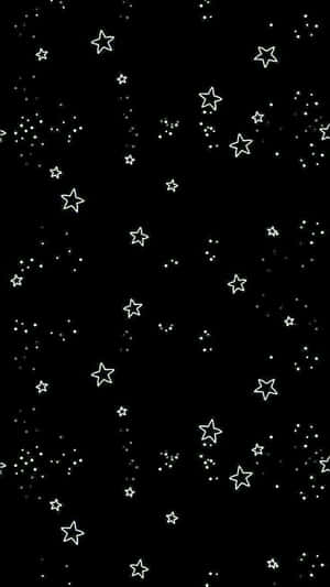 黑色背景搭配白色輪廓星星和點點，營造極簡夜空設計。
