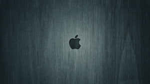 拉絲金屬背景上的Apple標誌