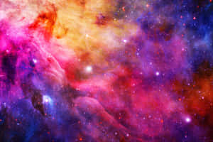 充滿活力的宇宙星雲，在深邃的太空中擁有發光的星星和旋轉的彩色氣體雲。 — 太空美學 GIF 壁紙