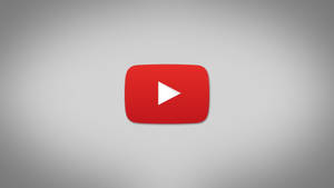 灰色背景上的 YouTube 播放按鈕標誌