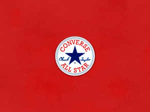 紅色布料背景上的 Converse All Star 標誌貼布