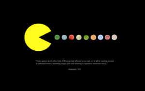 黃色 Pacman 面對彩色藥丸，黑色背景上有任天堂 CEO 引述。