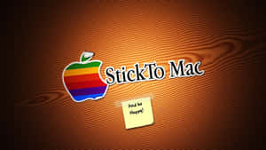 彩虹Apple標誌和「StickTo Mac」文字在木上，附有「Happy!」便利貼