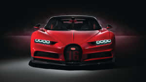 紅色Bugatti超級跑車在黑暗工作室中帶有煙霧效果，車頭燈發光。