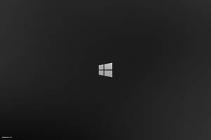 Windows標誌居中於深色漸變背景上 — 視窗 壁紙