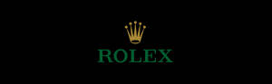 黑色背景上綠色 ROLEX 文字上方的金色皇冠標誌 — 淺綠色美學動態圖 壁紙