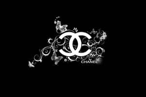 黑色背景上帶有蝴蝶和漩渦的Chanel標誌