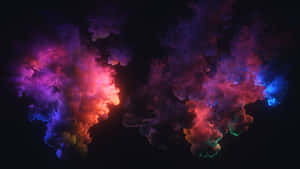 在黑暗中像宇宙星雲一樣旋轉的霓虹色墨水雲。 — 煙霧動畫 壁紙